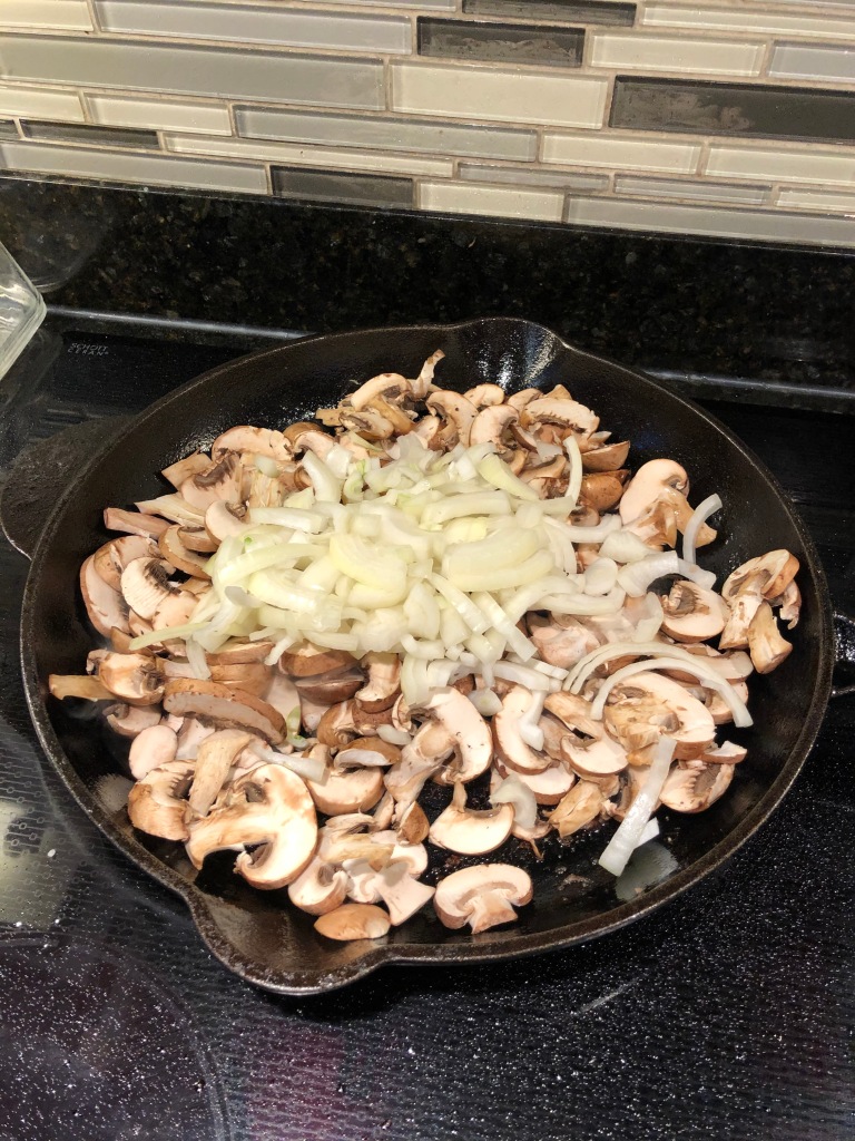 Stir fry the onions and mushrooms until both are slightly browned then season with salt and pepper to taste