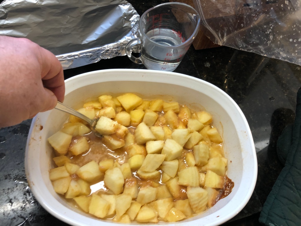 Carefully stir and lightly mash the cooked apples making sure to stir the apples and toffee together